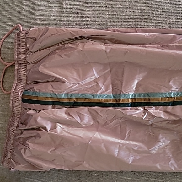 Pants they are brand new, rose color with stripes down the side. - Picture 5 of 10